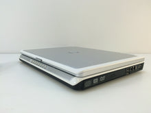 Load image into Gallery viewer, Laptop Dell Inspiron E1405 14.1" C2D T5200 1.6GHz 1GB 120GB DVDRW W7Pro