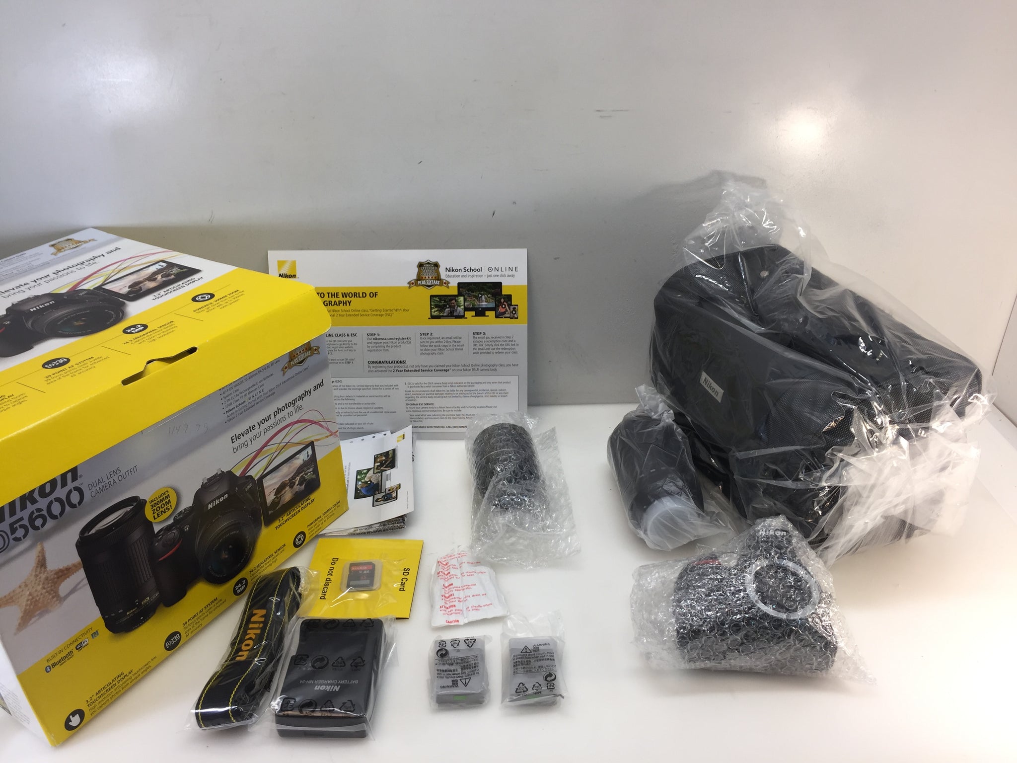  Nikon D5600 24.2MP DSLR Camera with 18-55mm VR and 70