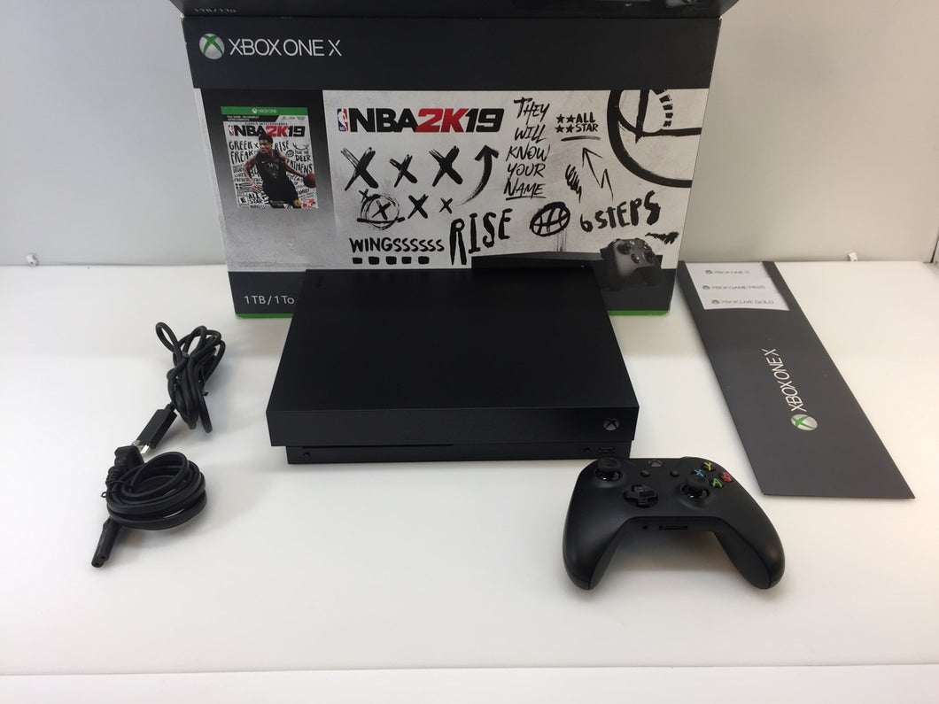 Xbox One X 1TB - video gaming - by owner - electronics media sale